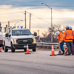 maintenance-workers-vehicles-fill-potholes